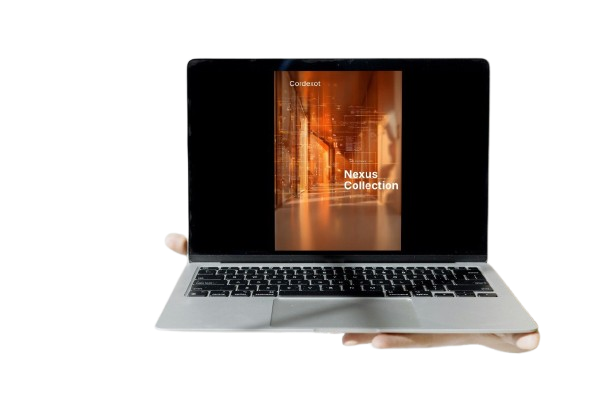 Laptop on a wooden stand with a blurred screen displaying 'Nexus Collection' on a white background